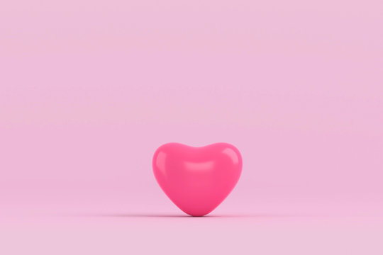 Pink heart on pink background. feeling happy with love. valentine day concept. minimal style concept