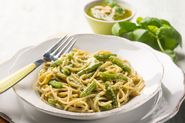 spaghetti with green beans and pesto sauce, selective focus