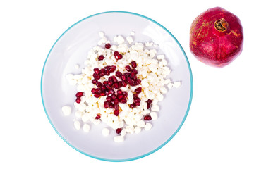 Healthy food. Delicious homemade cottage cheese with pomegranate seeds