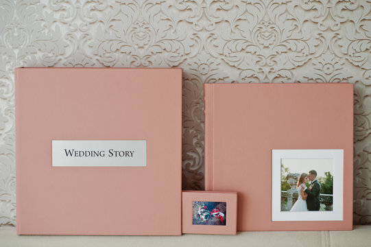 Gentle pink wedding photobook or photo album, box, and cd case.