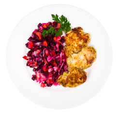 Plate with beetroot salad and grilled chicken fillet