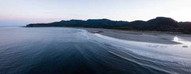 Aerial Panoramic Landscape View of Pacific Ocean Coast in Washington State. Taken during a vibrant sunrise.