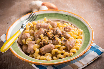 pasta with mushroom and sausage, selective focus
