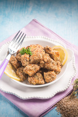swordfish croquettes with sesame seeds, selective focus