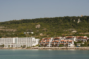 The resort is on the beach. Kavarna is a Black Sea resort in the Dobruja region of north-eastern Bulgaria.