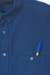 close-up view of stylish blue shirt with pen in pocket