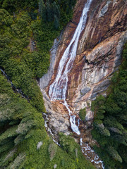 Aerial view from above of a beautiful waterfall, Depot Creek Falls. Taken Northeast of Seattle,...