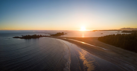 Fototapeta na wymiar Aerial panoramic seascape view of the Beautiful Beach on Pacific Coast during a vibrant sunny summer sunset. Taken near Tofino, Vancouver Island, British Columbia, Canada.