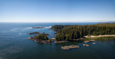 Fototapeta na wymiar Aerial panoramic view of the beautiful Pacific Ocean Coast during a vibrant sunny summer day. Taken near Tofino, Vancouver Island, British Columbia, Canada. 