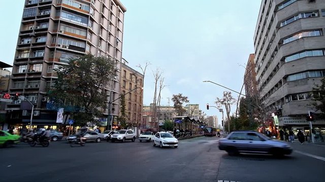 Traffic in Vali Asr Avenue, the longest street of the Middle East and the main shopping area of the city, Tehran, Iran