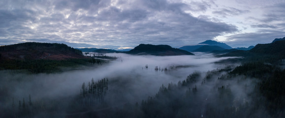 Aerial Drone Panoramic View of the Beautiful Canadian Landscape during a cloudy sunset. Taken in Vancouver Island, British Columbia, Canada.