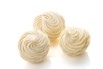 Homemade white zephyr or marshmallow isolated on white background