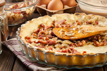 Making stuffing while preparing a traditional quiche