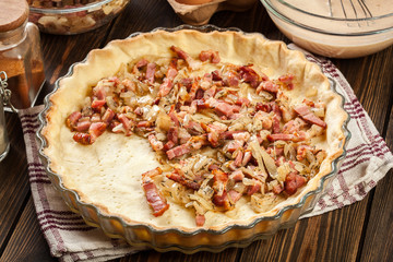 Making stuffing while preparing a traditional quiche