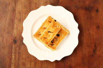  Maple sugar raisins multi-layer  biscuits on white plate    
