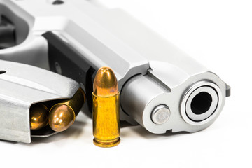 Gun with ammunition on a white background.