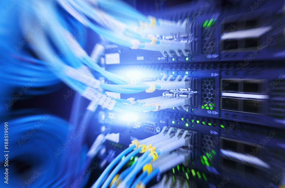 Poster fiber optical connector interface. rack mounted servers in a server room, server rack audio cable. s