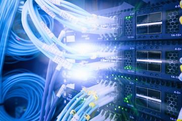 Fiber Optical connector interface. Rack Mounted Servers In A Server Room, Server rack audio cable. Severs computer in a rack at the large data center. has a small noise.