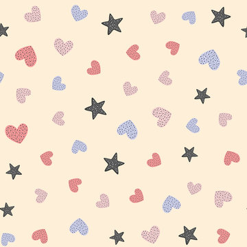 Repeated cute hearts and stars drawn by hand. Romantic seamless pattern.