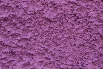 Purple Texture of plaster on the wall, cracked background, stone surface