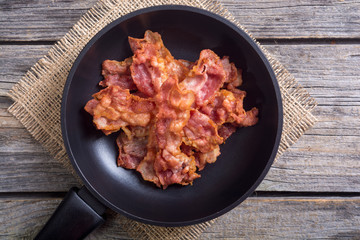 Sliced fried bacon