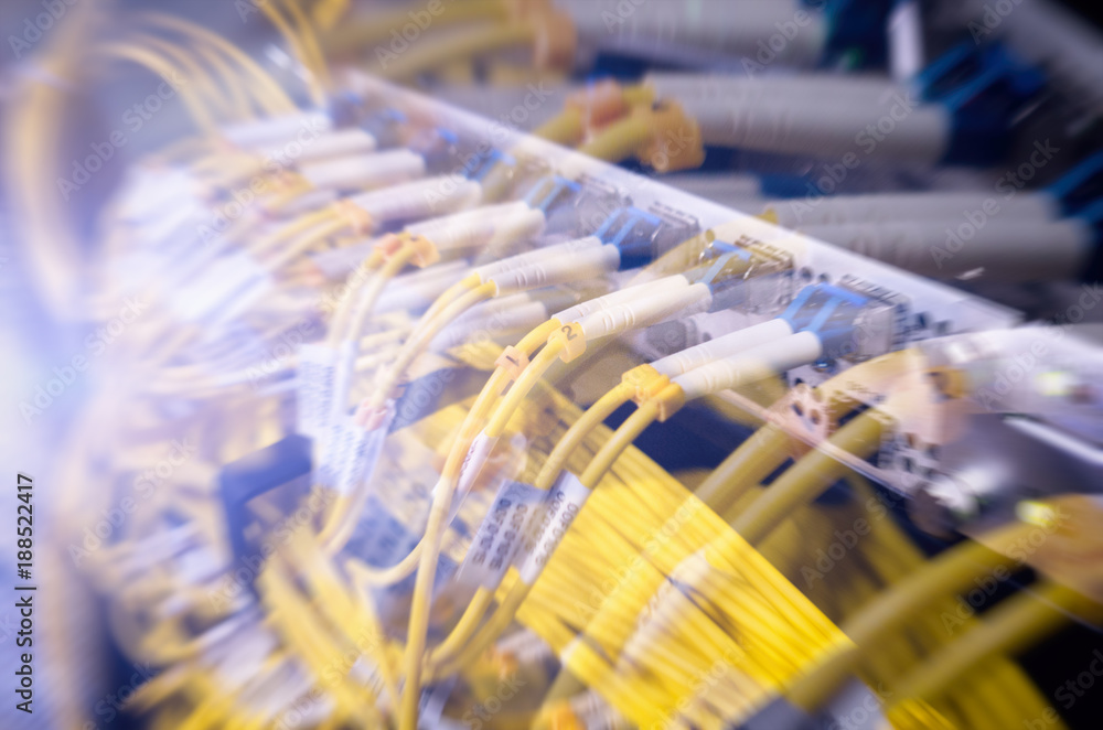 Poster fiber optical connector interface. rack mounted servers in a server room, server rack audio cable. s