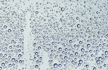 waterdrops against a window on white background.