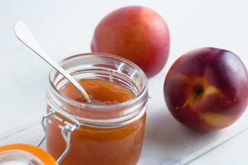 Glass jar of Peach Jam