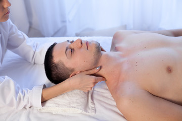 Fototapeta na wymiar male masseur doing Massage Spa health
