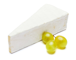 Piece of brie or camambert cheese on a white background