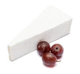 Piece of brie or camambert cheese on a white background
