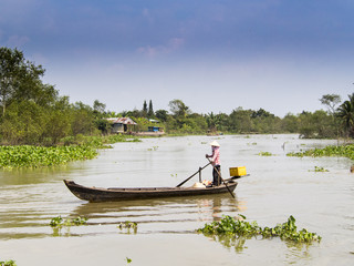 Boat sailing through the mekong delta