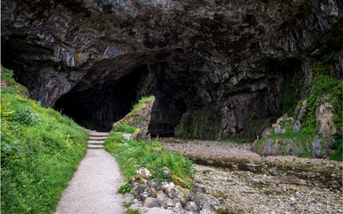 Smoo Cave, Durness, Scotland. The entrance to the local landmark Smoo Cave near Durness,...