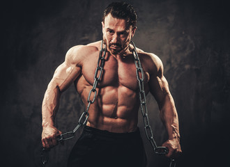 Man showing his muscular body