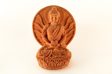 Figurine sitting statue healing Buddha isolated on white background / Tibetan and indian medicine...