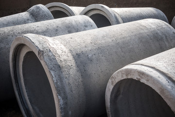 Close Up Photo Of Cement Tubes Used In Road Construction