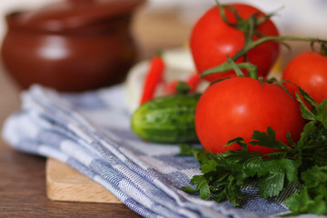 Fresh vegetables and herbs. Tomatoes, cucumbers, pepper