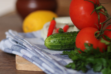 Fresh vegetables and herbs. Tomatoes, cucumbers, pepper