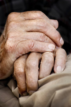 Close-up of wrinkled hands of senior man