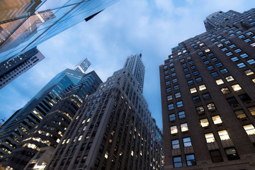 Fototapeta na wymiar Buildings in Manhattan new york skyline skycrapper bluesky afternoon dawn clouds rainy day