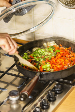 Chopped vegetables on frying pan