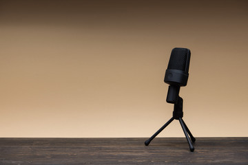 equipment for field audio recording on beige background. Usb microphone