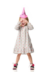 Obraz na płótnie Canvas Young girl kid surprised shout in birthday party pink cap