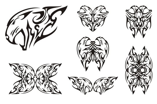 Tribal aggressive tiger head symbols. The growling head of a tiger can be used as a tattoo, double decorative symbols, similar to butterflies, formed from her. Black on white