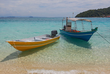 Naklejka na ściany i meble Bright colorful touristic boats anchored near beach, Redang island, Malaysia