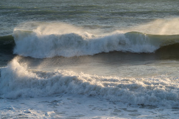 Waves breaking on the coast