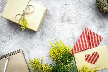 concept International Women Day with flowers stone background to