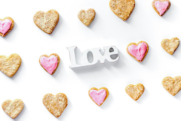 cookies for Valentine Day heartshaped white background top view 