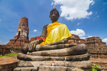 Fototapeta premium The Buddha statues and temples at Ayuthaya province which surviving from the war between Thailand and Burma.