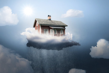 Haus auf einer regnenden Wolke